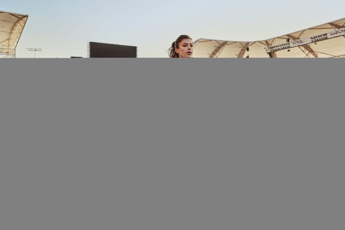 Sofia Huerta warms up on the field.